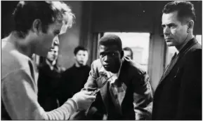  ?? ?? Sidney Poitier (center) stars with Vic Morrow and Glenn Ford in a scene from “Blackboard Jungle.”