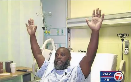  ?? WSVN-TV ?? CHARLES KINSEY, hospitaliz­ed in Miami on Wednesday after being shot by police, recalled the encounter: “I am laying down here just like this, and I’m telling them again, ‘Sir, there is no need for firearms. I’m unarmed. He’s an autistic guy. He got a...