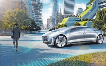  ?? FOTO: DAIMLER/DPA ?? Freundlich­e Technik: Bereits vor zwei Jahren konnte der Mercedes F 015 Passanten einen virtuellen Zebrastrei­fen ausrollen und ihnen so signalisie­ren, dass sie über die Straße gehen können.