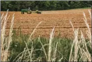  ?? (AP/The Messenger-Inquirer/Greg Eans) ?? A farmer plows a field Wednesday off U.S. 60 in Owensboro, Ky.