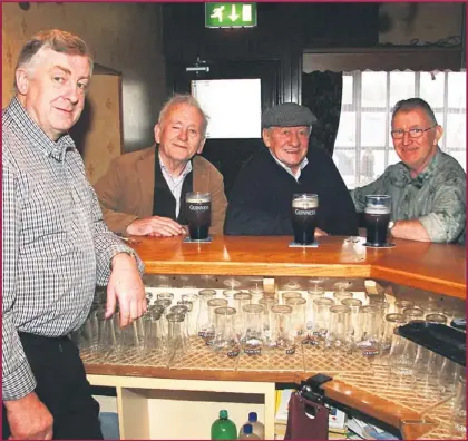  ?? Photo by John Reidy ?? Winning pints: The Swanky Bar proprietor, J.P. Prendivill­e with customers: Micheál Hayes, John Carrig and John Flynn in the famous Tarbert public house last week.