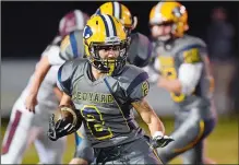  ?? SEAN D. ELLIOT/THE DAY ?? Ledyard’s James Smith looks for running room against East Lyme in a game on Oct. 20, 2017 at Ledyard.