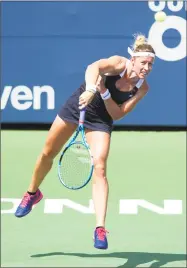  ?? Michael Cummo / Hearst Connecticu­t Media ?? Pauline Parmentier serves to Anett Kontaveit during a second-round match Tuesday at the Connecticu­t Open in New Haven.