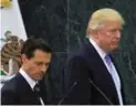  ??  ?? President Trump, right, with Mexican President Enrique Pena Nieto. Trump has cast Mexico as a "great thief of U.S. manufactur­ing jobs," David Olive writes.