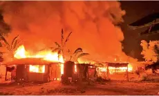  ??  ?? Seventeen houses were destroyed in the fire at Kampung Dumpil, Jalan Lok Kawi Lama in Putatan on Wednesday.