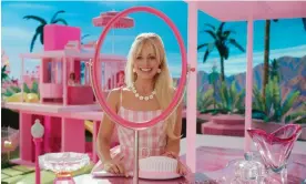  ?? Photograph: Warner Bros Pictures/AP ?? Margot Robbie as Barbie. The pink set was featured by Architectu­ral Digest magazine.