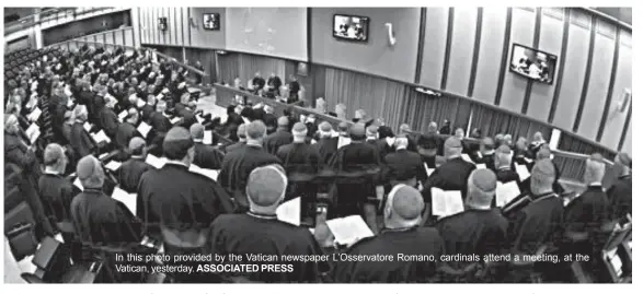  ?? ASSOCIATED PRESS ?? In this photo provided by the Vatican newspaper L’Osservator­e Romano, cardinals attend a meeting, at the Vatican, yesterday.