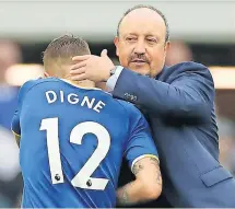  ?? ?? HAPPIER TIMES Digne gets a pat from Goodison boss Benitez