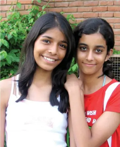  ?? COURTESY FIZA JHA ?? Aarushi Talwar, right, with best friend Fiza Jha in a photo taken when they attended dance class together. In 2008, Aarushi, then 13, was found dead in her bedroom. Her parents were convicted, but a new book casts doubts on the ruling.