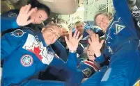  ?? NASA ?? Canadian David Saint-Jacques, second from left, joins the other crew members of Expedition 57 at the Internatio­nal Space Station on Monday.