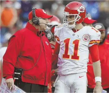 ?? AP PHOTO ?? REVENGE SERVED COLD? Chiefs coach Andy Reid, left, and quarterbac­k Alex Smith are plotting a plan for revenge against the Steelers today in icy Kansas City.