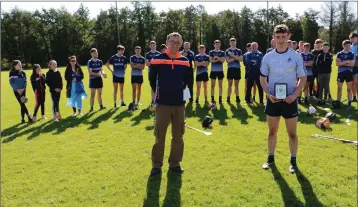  ??  ?? Meitheal Cleary receives his Wicklow People sponsored man of the match award from Brendan Lawrence.