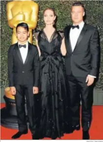  ?? GETTY IMAGES ?? Maddox, junto a su padres, en la gala de los Oscars de 2013.
