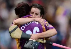  ??  ?? An emotional Claire O’Connor with Louise O’Leary after winning the last of her four All-Ireland Senior camogie medals in 2012.