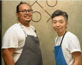  ??  ?? Chefs Jordy Navarra of Toyo Eatery and Richie Lin of Mume