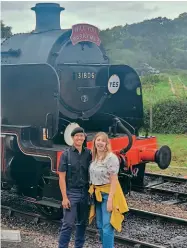  ?? ?? Nathan Au and Rhianna Webb with No. 31806 at Norden. One commentato­r posted on Facebook: “This must be one of those photoshopp­ed pictures. Everyone knows that railmen are married to their trains.” VICKI DYKE