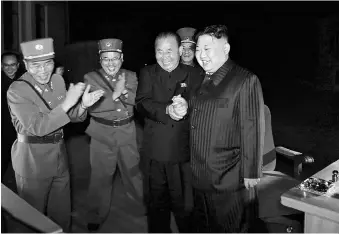  ?? REUTERS ?? North Korea’s Supreme Leader, Kim Jong-Un, after the second test-fire of the interconti­nental ballistic missile Hwasong-14 last month