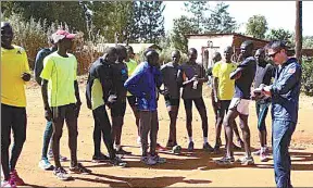  ?? JANE CHOU FOR CHINA DAILY ?? Tao Shaoming, marathon coach and agent, instructs athletes at his training camp in Kenya in 2014.