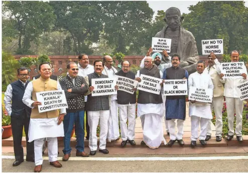  ?? ?? CONGRESS MPS STAGE A PROTEST against Operation Kamala in Karnataka, in New Delhi on February 11, 2019. The BJP’S toppling games began in Madhya Pradesh, Karnataka, and Rajasthan after the 2018 Assembly election results were announced but. reached fruition in July 2019 in Karnataka and March 2020 in Madhya Pradesh.