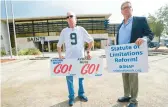  ?? MATTHEW HINTON/AP 2020 ?? Richard Windmann, left, and John Gianoli, members of the Survivors Network of those Abused by Priests, protest in Metairie, Louisiana.