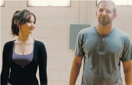  ?? WEINSTEIN COMPANY ?? With Jennifer Lawrence, shown with Bradley Cooper in Silver Linings Playbook, picking up most of the pre-Oscar hardware, she’s also likely to win the best-actress award Sunday. Best actor award will likely go to Daniel Day-Lewis for his portrayal of...