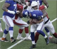  ?? BILL KOSTROUN - THE ASSOCIATED PRESS ?? Arizona Cardinals’ Haason Reddick, right, knocks the ball loose as he tackles New York Giants quarterbac­k Daniel Jones during the first half of an NFL football game, Sunday, Dec. 13, 2020, in East Rutherford, N.J.