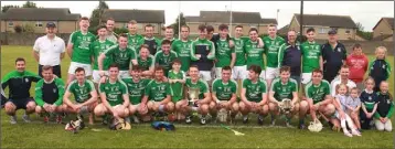  ??  ?? The Naomh Eanna squad celebrate their ACHL Division 2 final success.