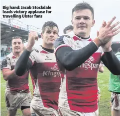  ??  ?? Big hand: Jacob Stockdale leads victory applause for travelling Ulster fans