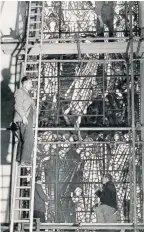  ??  ?? >
The Burne-Jones windows in the cathedral being removed in the war
