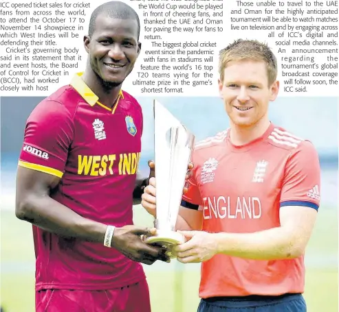  ?? FILE ?? Captains Darren Sammy (left) of the West Indies and England’s Eoin Morgan with the ICC Twenty20 World Cup Trophy at Eden Gardens in Kolkata, India, ahead of the 2016 final. West Indies won the final by four wickets.