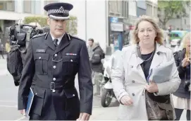  ?? — Reuters ?? Metropolit­an Police Commander Stuart Cundy and (right) Elizabeth Campbell, the leader of Kensington and Chelsea Council arrive at the Grenfell Tower Inquiry in central London, Britain.