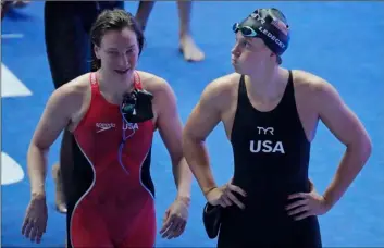  ??  ?? United States’ swimmer Katie Ledecky (right) reacts following the women’s 4x200m freestyle relay final at the World Swimming Championsh­ips in Gwangju, South Korea, on Thursday. AP Photo/lee JIn-mAn