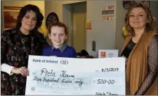  ??  ?? Milltown Presentati­on student Adele O’Brien presents her cheque to Pieta House, with Maureen Curtin (left) and is Cora O’Brien.