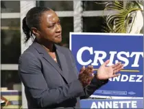  ?? LYNNE SLADKY – THE ASSOCIATED PRESS ?? Laphonza Butler, president of Emily's List, listens during a rally held by the Latino Victory Fund in 2022in Coral Gables, Fla.