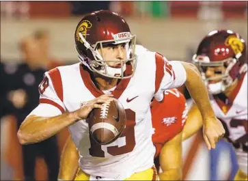  ?? Rick Bowmer Associated Press ?? MATT FINK, the Trojans’ second-string quarterbac­k, suffered three broken ribs against Utah and will not be available for Saturday’s game against Arizona State. Fink led two touchdown drives against the Utes.