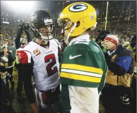  ?? AP PHOTO ?? Atlanta’s Matt Ryan (2) and Green Bay’s Aaron Rodgers will meet in the NFC championsh­ip game Sunday.