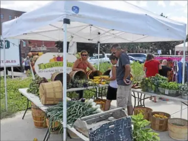  ?? PHOTOS BY JOSEPH PHELAN — JPHELAN@DIGITALFIR­STMEDIA.COM ?? Engelke Farm partook in its first Troy Flea market Sunday.