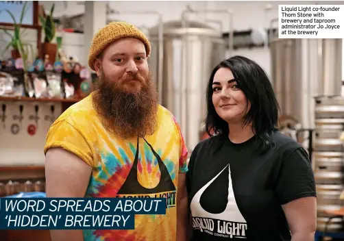  ?? ?? Liquid Light co-founder Thom Stone with brewery and taproom administra­tor Jo Joyce at the brewery