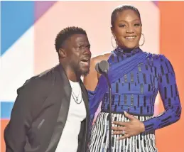  ?? WIREIMAGE ?? Kevin Hart and Tiffany Haddish threw a few shots during the MTV Video Music Awards at Radio City Music Hall on Monday night.