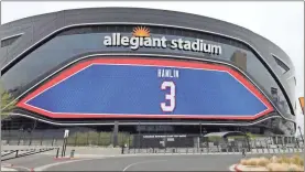  ?? Ethan Miller/Getty Images North America/TNS ?? A video board at Allegiant Stadium, home of the Las Vegas Raiders, displays a show of support for Buffalo Bills player Damar Hamlin who suffered cardiac arrest after making a tackle during Monday night’s football game against the Cincinnati Bengals on Jan. 4, in Las Vegas.