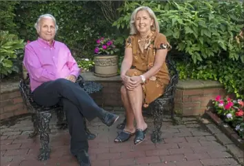  ?? Pittsburgh Post-Gazette ?? Dr. Arthur Levine, executive director of the University of Pittsburgh Brain Institute, and his wife, Linda Melada, at their home in Shadyside.