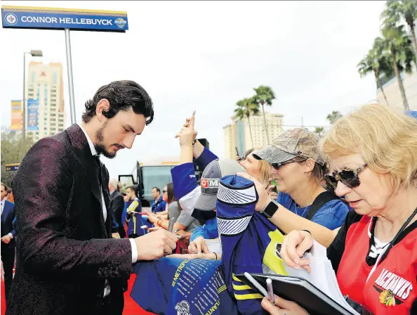  ?? MIKE EHRMANN / GETTY IMAGES ?? The Winnipeg Jets’ Connor Hellebuyck finds himself among the NHL leaders this season in wins, shutouts and save percentage.