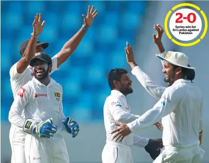  ?? Photo by Shihab ?? Lankan players celebrate after winning the second Test against Pakistan in Dubai on Tuesday. —