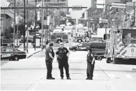  ?? LLOYD FOX/BALTIMORE SUN ?? Authoritie­s evacuated several buildings in downtown Baltimore on Monday morning due to a suspicious vehicle, according to Baltimore police and building security sources. A spokesman for the Maryland Department of the Environmen­t said about 80 gallons of diesel fuel was offloaded from the vehicle.