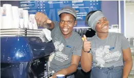  ?? Picture: ABONGILE SOLUNDWANA ?? ESPRESSO?: At your service are, from left, barista Nolutho Mhlakane and head barista Xhanti Ndolela at the opening of the Seattle Coffee outlet at Alan Hahn Motors in Cathcart Road, Komani
