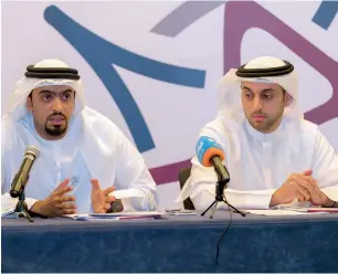  ??  ?? Mansour Al Mansouri and Dr Rashid Al Nuaimi of the NMC at the Press conference announcing the new regulation­s that will govern online activities, including ecommerce, publishing and advertisin­g.