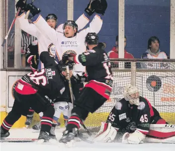  ??  ?? Nathan Salem celebrates scoring for Phantoms at Planet Ice on Saturday.