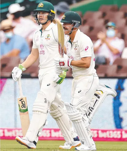  ?? ?? Will Pucovski and David Warner in Sydney in January. Warner hopes to rekindle the partnershi­p at the Gabba. Picture: Getty Images