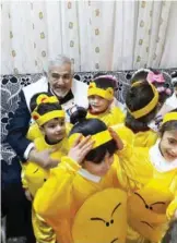  ??  ?? Dr Hilal Al-Sayer poses with Syrian orphans.
