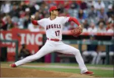  ?? MARK J. TERRILL — THE ASSOCIATED PRESS ?? Rookie two-way sensation Shohei Ohtani was outstandin­g on the hill Sunday. Ohtani allowed six hits and struck out nine as the Los Angeles Angels topped Tampa Bay, 5-2.